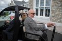 Rupert Murdoch, Jerry Hall and Donald Trump at his north-east golf course
