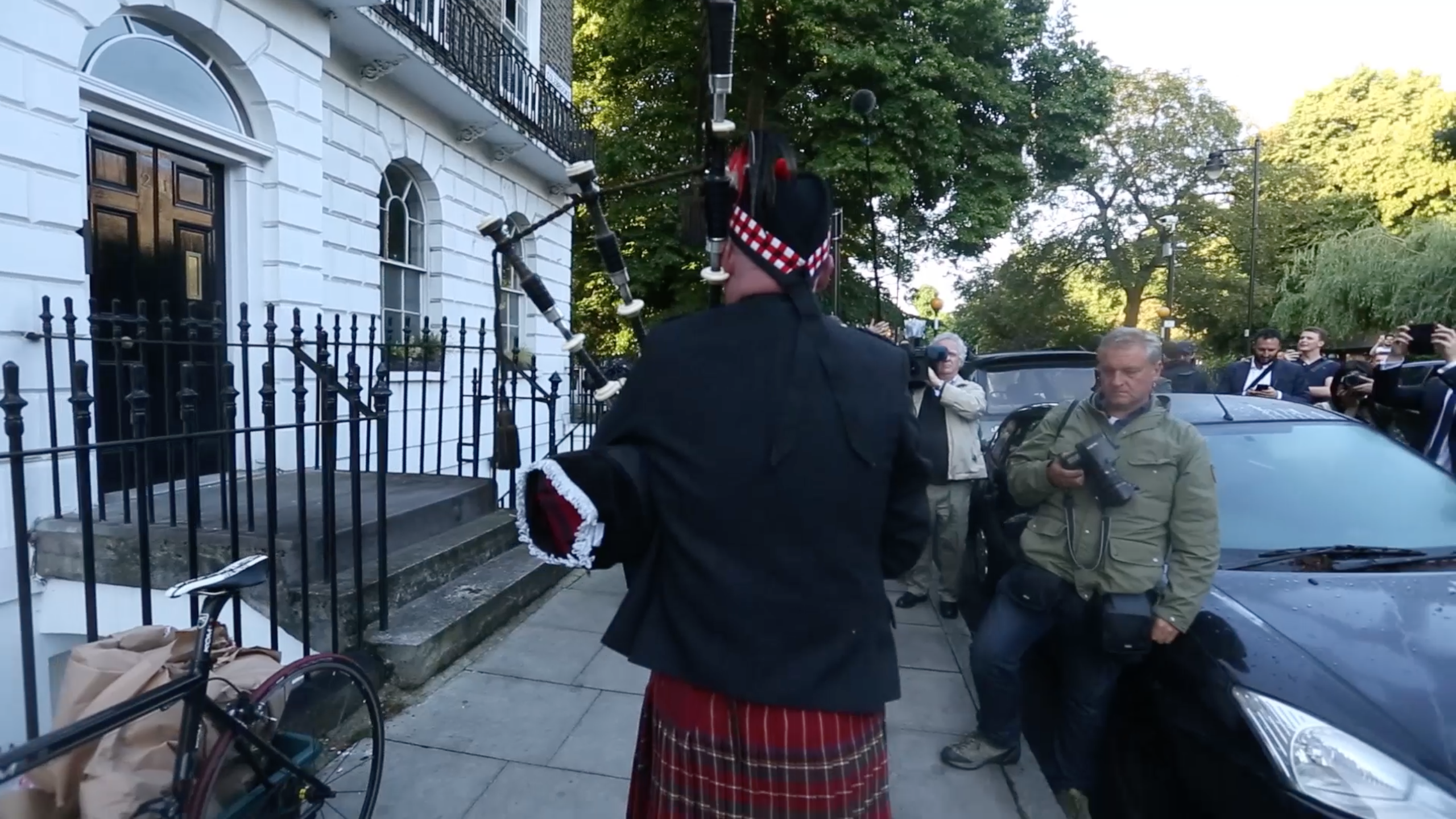 Bagpiper outside Boris Johnson's home