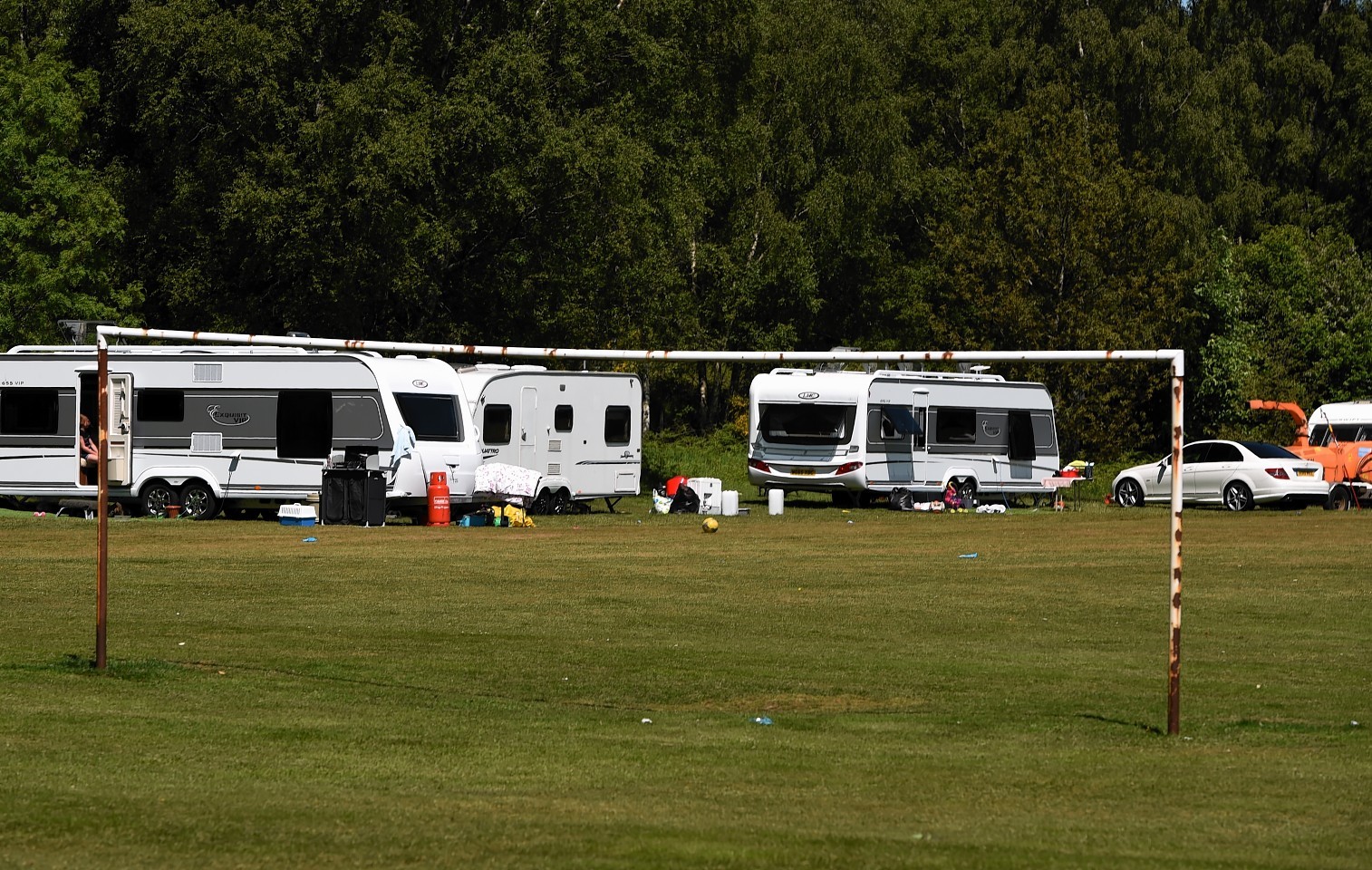 Travellers have pitched on playing fields owned by Aberdeenshire council at Glebe Park, Drumoak.