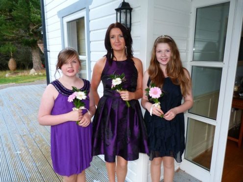 Debbie Gilham with daughters Georgia, left, and  Bethany, right.