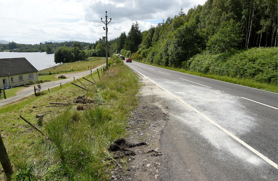 Marks on the road and a broken fence mark the spot of yesterday afternoons accident on the A82 north of Fort Augustus.