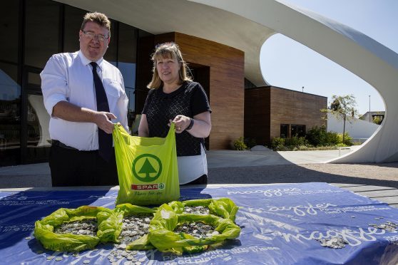 Bill Christie, SPAR Area Manager, and Susan Sutherland, Maggie's Aberdeen centre head.