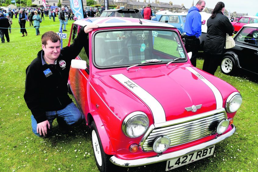 KENNETH ADDISON WITH HIS 1994 MINI COOPER 1.3 WICH HE HAS SPENT THE LAST FOUR AND A HALF YEARS RESTORING.