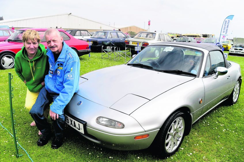 ERIC BREMNER AND ELSIE CRUIKSHANK FROM ABERDEEN WITH THEIR 1991  MAZDA EUNOS ROADSTER