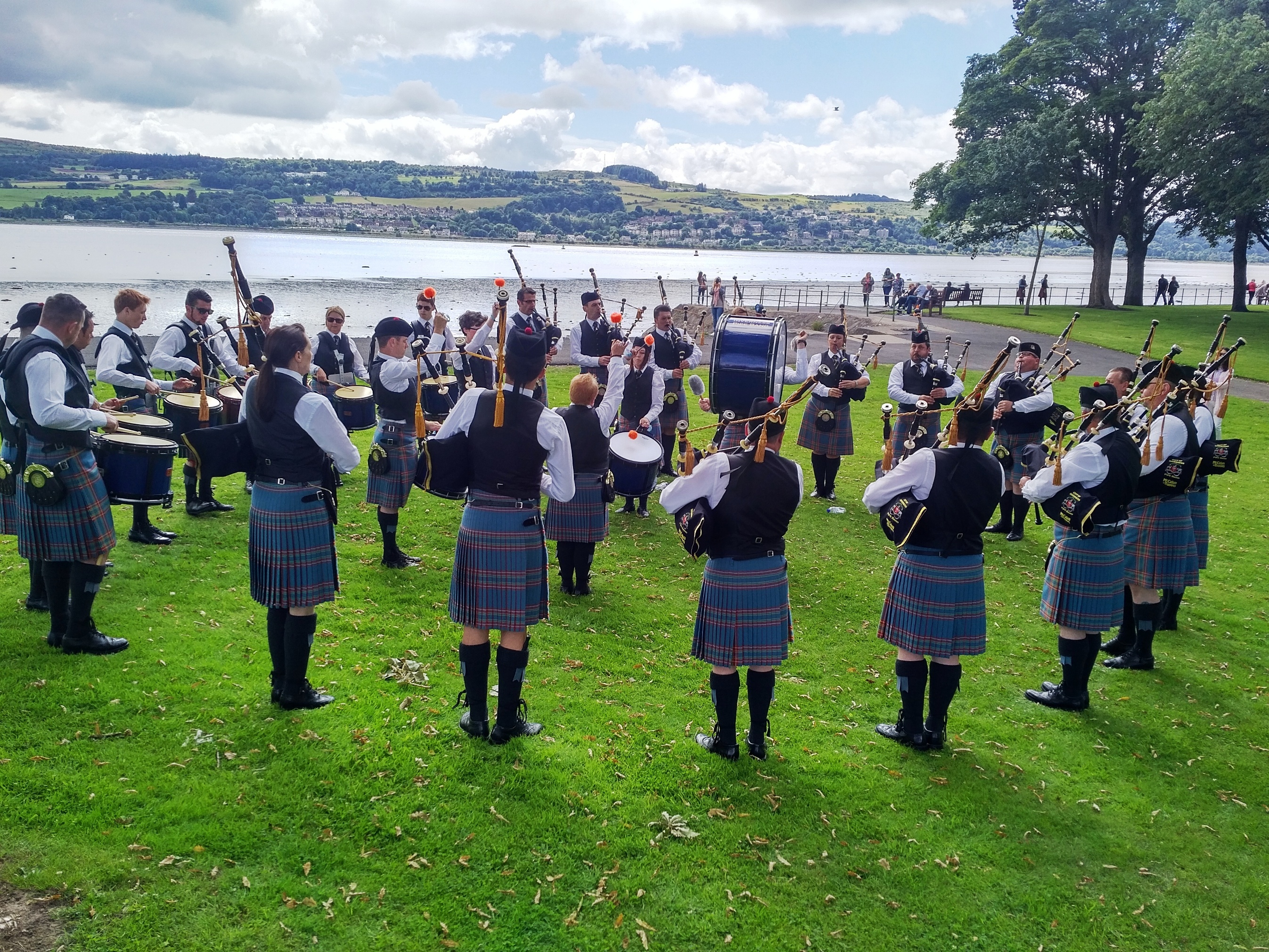 City of Inverness Pipe Band playing on the seafront at Dumbarton