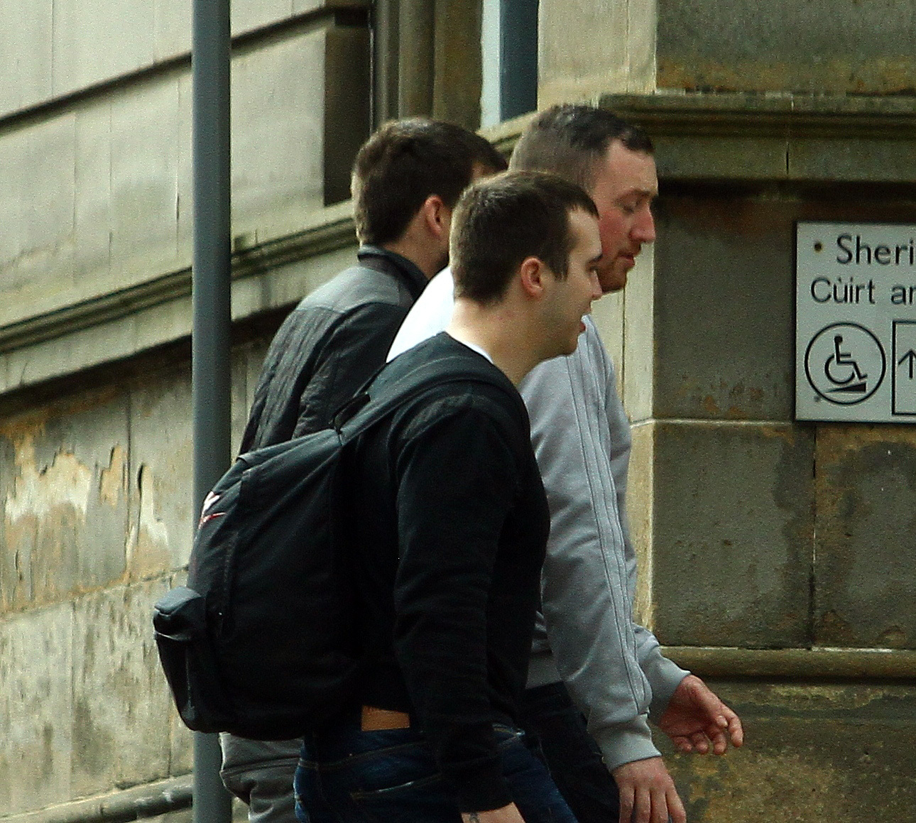 Damian McAuley (right) arriving at Oban Sheriff Court today, where he was sentenced to 10 months in jail