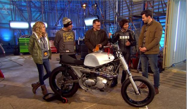 Guyt Martin with the motorcycle used to break the Wall of Death speed record. Picture: CH4/Universal News And Sport.