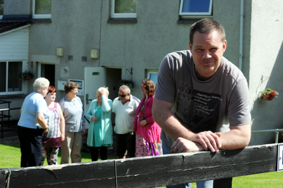 Jamie Wright, service user, with other service users in front of Horizon Resource Centre, Duffus Road, Elgin, which is set to close. Picture by Gordon Lennox.