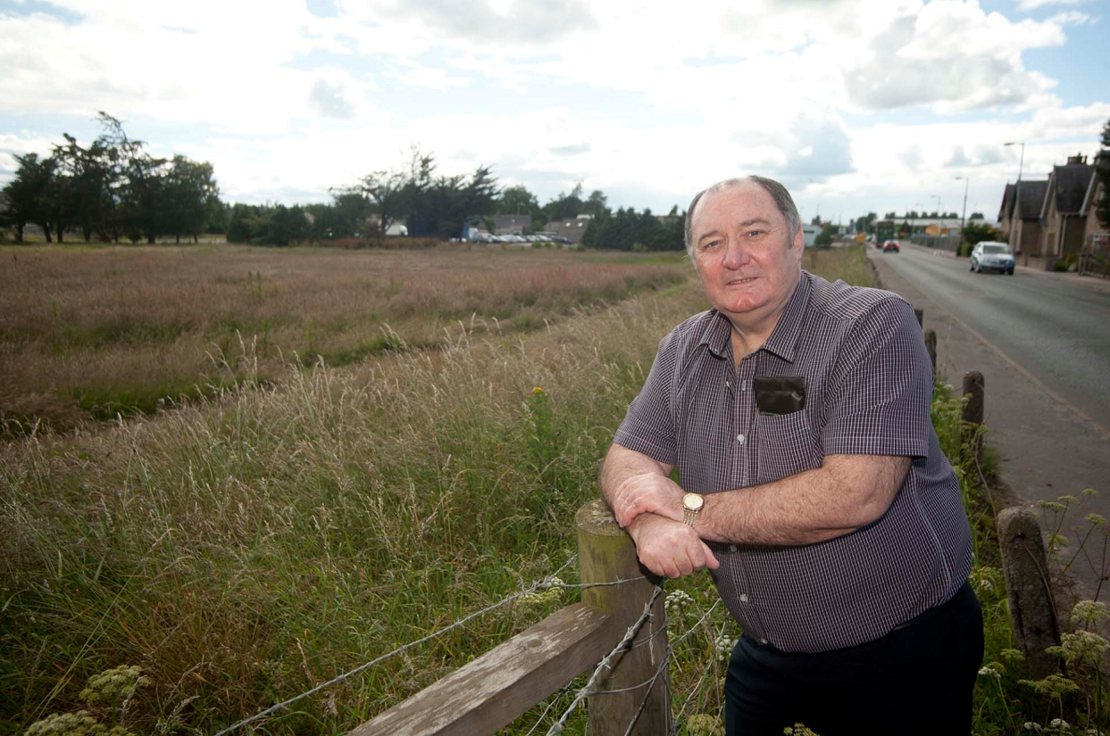 ANM Group want to develop the land on Linkwood Road in Elgin into a care home, houses and pub or restaurant. Pictured: Elgin City South councillor John Divers.