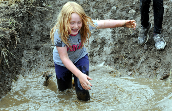 Iris Geddes enjoys one of the previous mudder races.