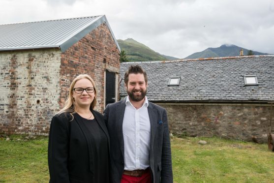 Noru and Craig Innes outside the building they are turning into a micro distillery