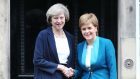 Prime Minister Theresa May is greeted by Scottish First Minister Nicola Sturgeon at Bute House in Edinburgh