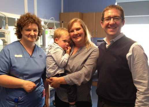 Staff midwife Jane Elliot with Alexander, Megan and Alan Mackenzie at SCBU