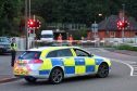 Traffic restrictions were in place on a major route through Inverness on Tuesday evening after the rail crossing barriers at the Harbour Road / Millburn Road roundabout broke down. Picture: Andrew Smith