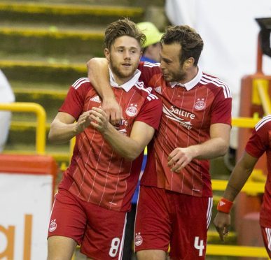 Wes Burns scored with his first touch on his debut for the Dons.