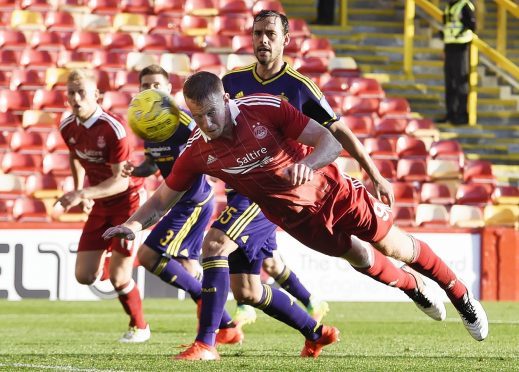 Aberdeen's Adam Rooney fails to score with a diving header
