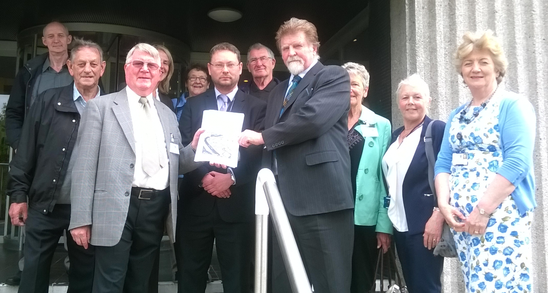 The petition being delivered to Councillor Martin Kitts-Hayes from Ken Ledingham