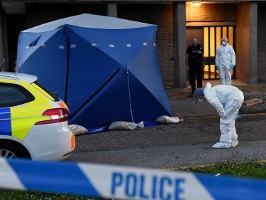 Police at the scene of Donside Court