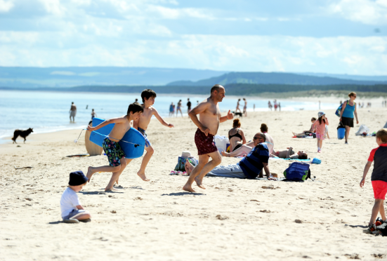 Families having fun in the sun at Lossiemouth earlier this year