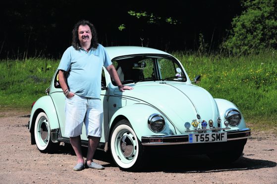 Martin Gray of Auchenblae, with his 2003 Ultima Edition VW Beetle.