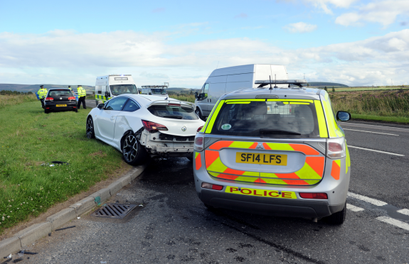 Extensive damage was caused to both cars following the collision two miles outside Keith.