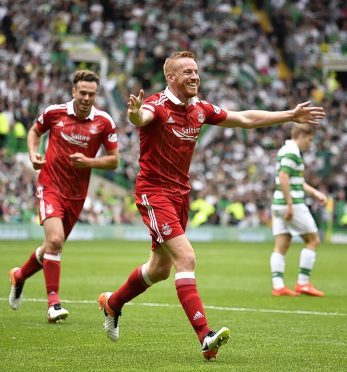 Adam Rooney celebrates his goal