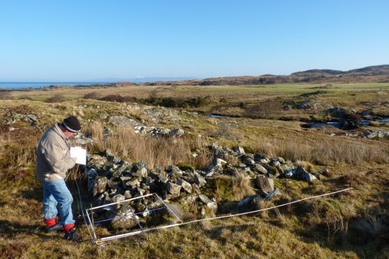 Members of AHHA creating digital imagery of the 18th century graveyard at Camas nan Geall