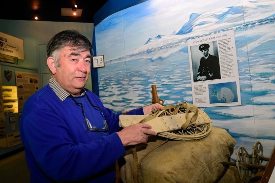 FRASERBURGH HERITAGE CENTRE VOLUNTEER BENNY NOBLE IN THE FAMOUS BROCHERS EXHIBITION AREA WITH A PAIR OF SNOWSHOES WORN BY ANTARCTIC EXPLORER STEWART SLESSOR.