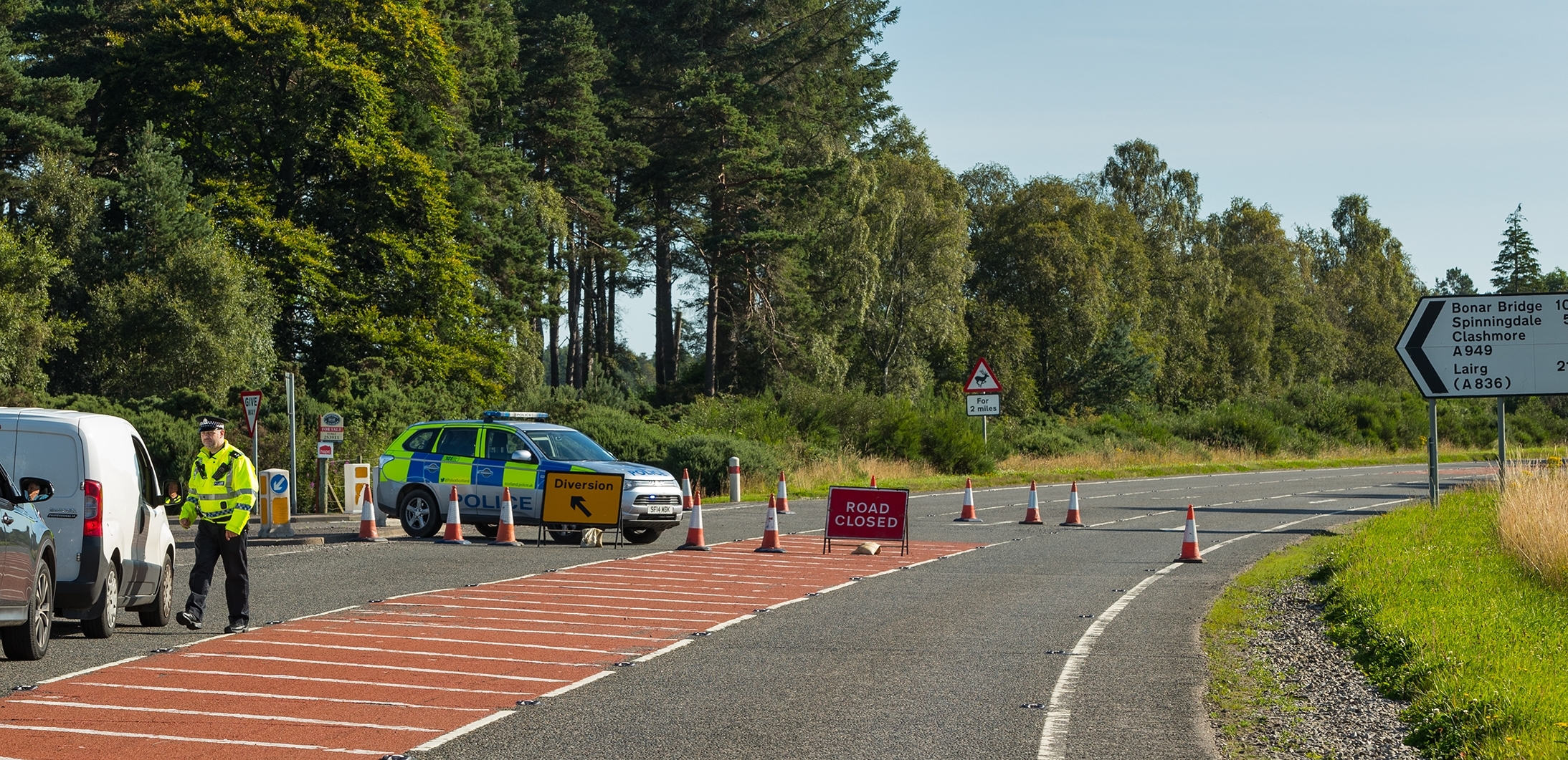 The A9 is closed after a pedestrian was killed in a collision with a car