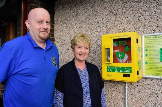 Golf club steward Stevie Murdoch and administrator Margaret Milne.