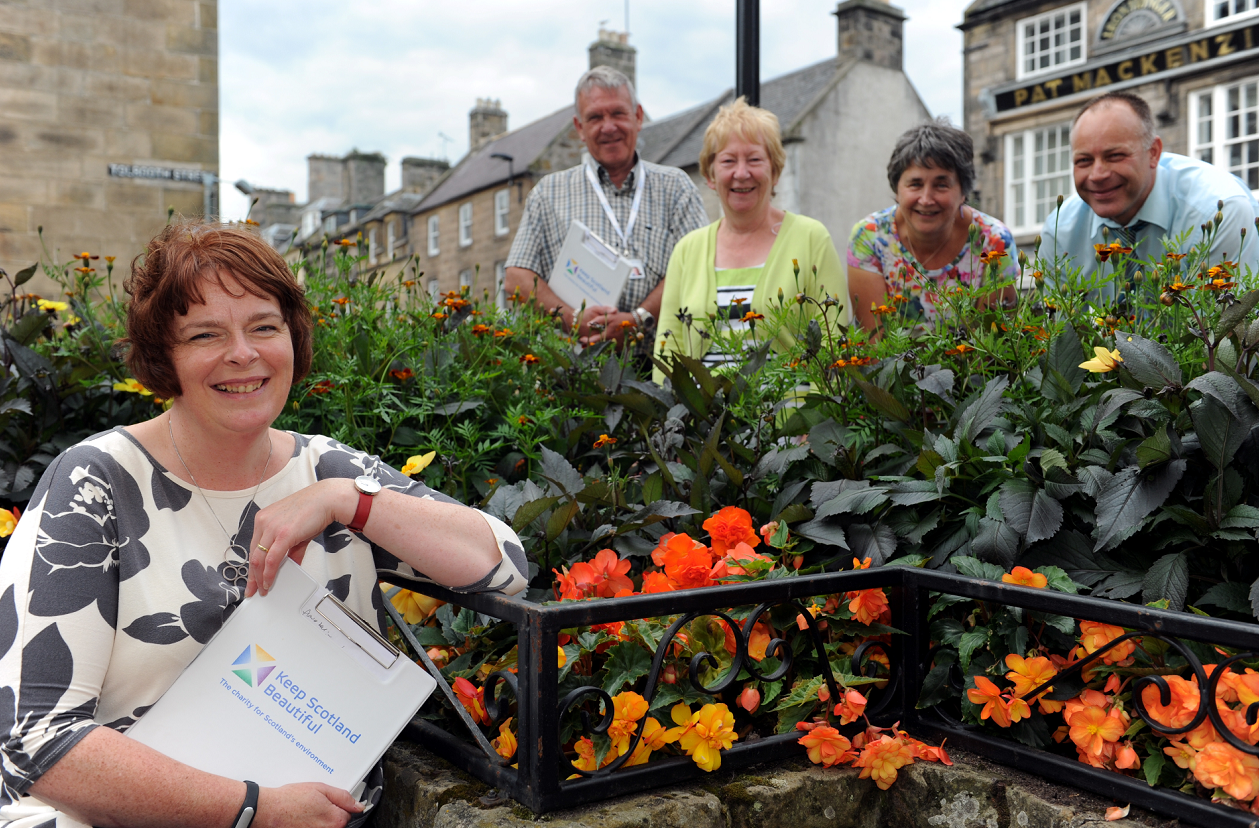 Forres was judged by Scotland In Bloom judges, Liz Stewart, front and Joe Smyth, back left, showing them round Forres were, Dandra Maclellan, vice-chairwoman Forres In Bloom, back second left, Diane McGregor, chairwoman Forres In Bloom, back second right, and Grant Speed, Asistant Lands and Parks Officer Moray Council, back right. Picture by Gordon Lennox