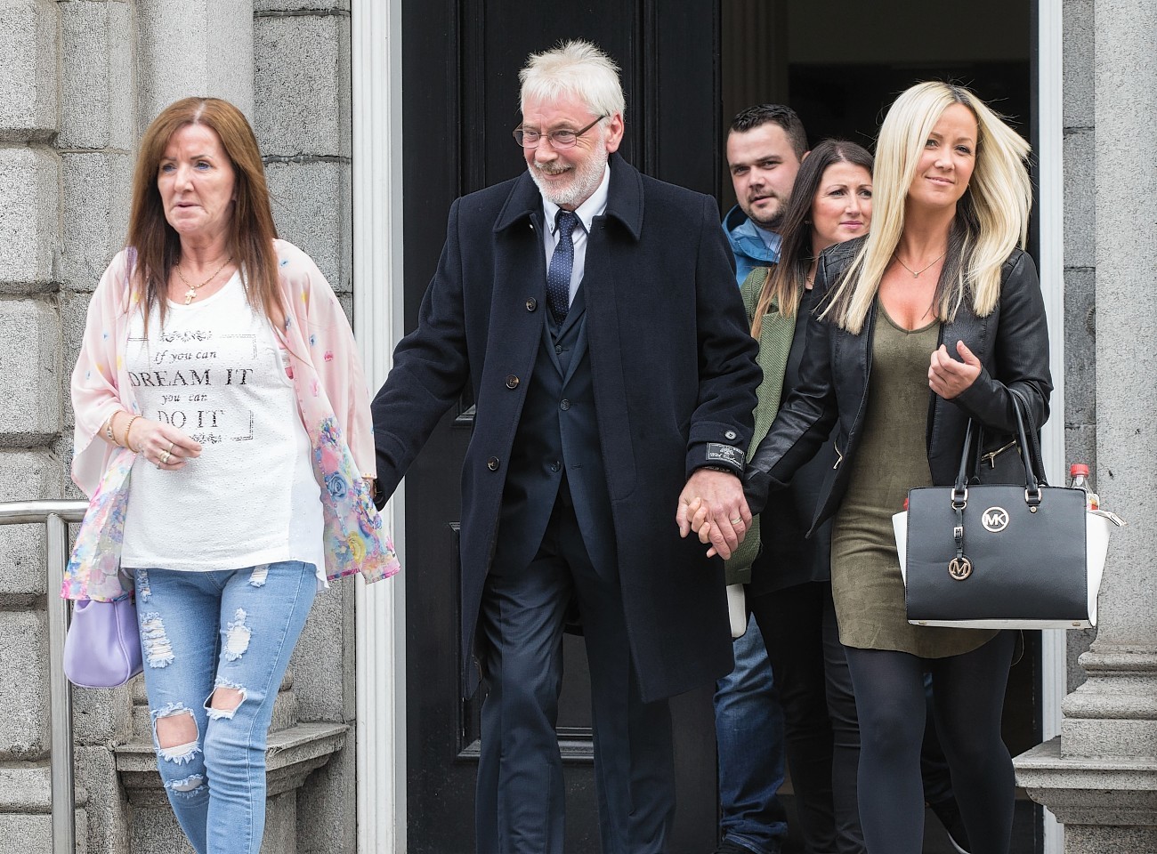 The Gallagher family left court holding hands