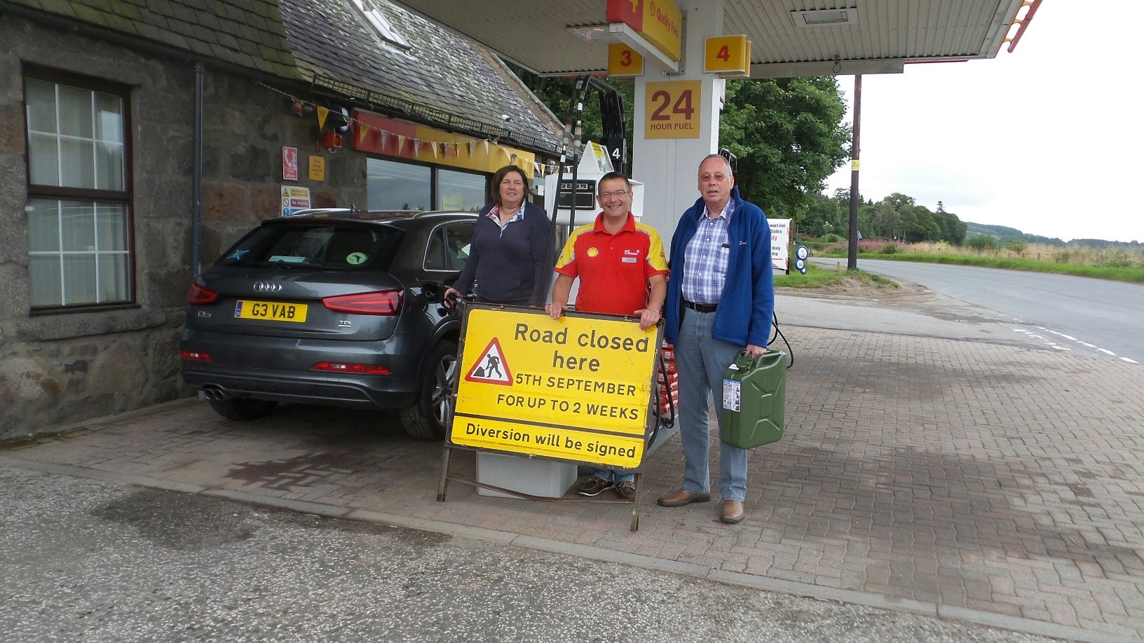 Geva Blackett, petrol station owner Peter Gray and John Lucas, chairman of the Torphins Community Council