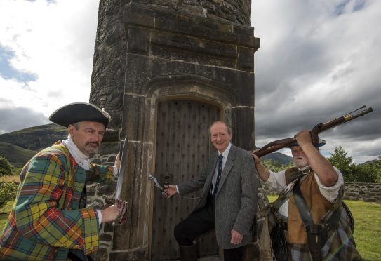 GLENFINNAN MONUMENT RE-OPENING.  20/08/16. Vice President of the National Trust for Scotland , Professor Hugh Cheap, (centre), officially re-opens Glenfinnan Monument after its restoration with the help of two 'Jacobites' (L-R, Jonathan Wartnaby, Learning Officer at Culloden Battlefield and Charlie Murray Beattie),     PIC THE WRITE IMAGE, FORT WILLIAM.  01397 703323.