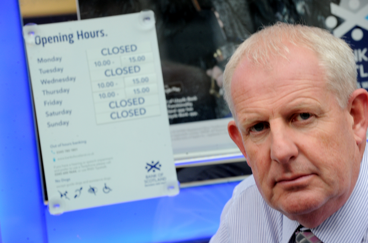 Leading Fochabers businessman, Gordon Christie, outside the Bank of Scotland in the Main Street, which is to close in November, leaving Fochabers without a bank. Picture by Gordon Lennox.