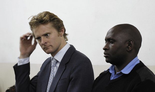 Jack Marrian, left, appears at Kibera Law Court in Nairobi, Kenya