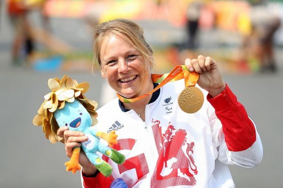 Karen Darke with her gold medal won in Rio