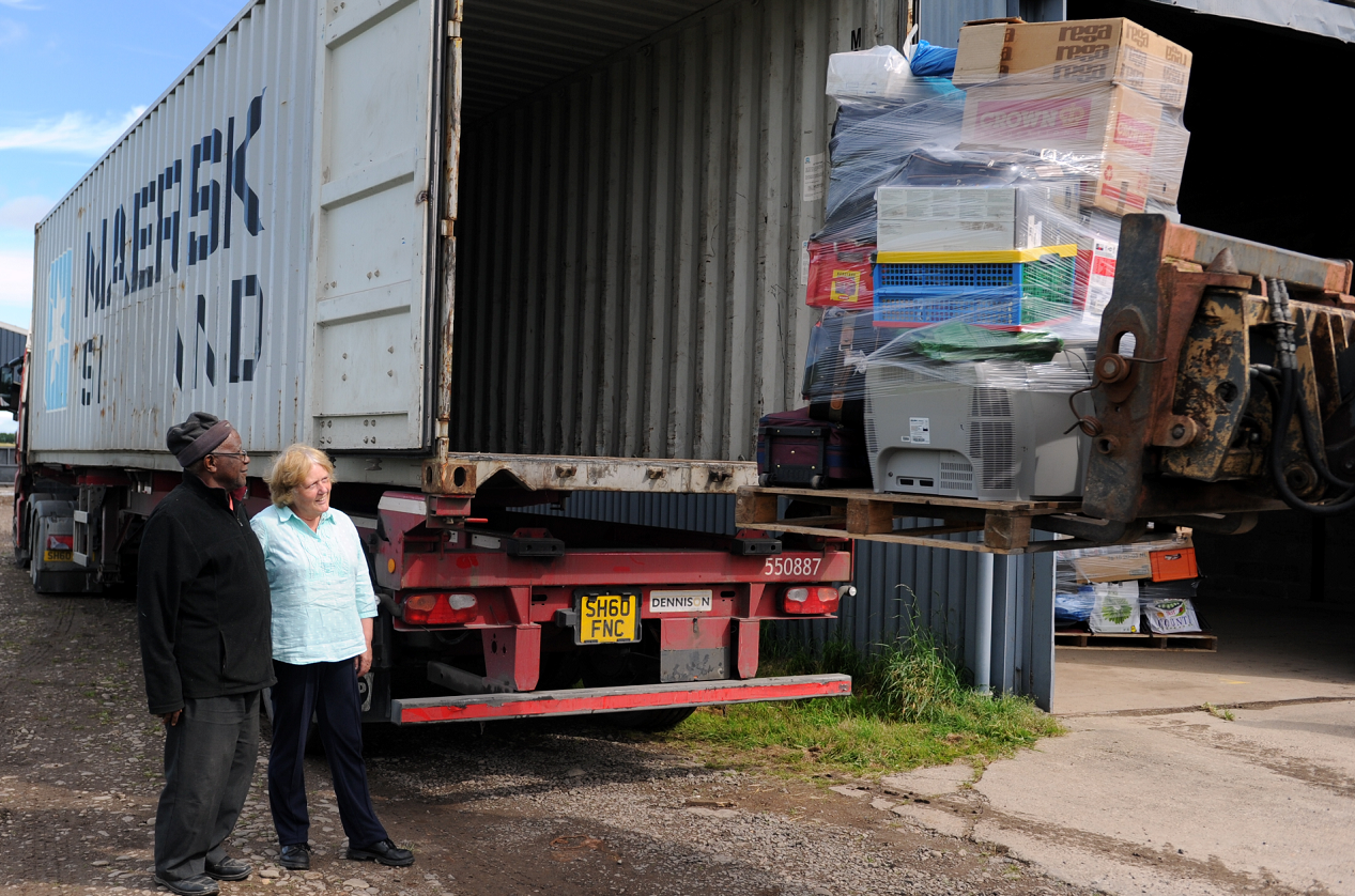 Moira and Lansana Bangura at Sherifston Farm, Elgin, loading the container truck, helped by willing volunteers, with goods for onward shipping to Sierra Leone. Picture by Gordon Lennox.