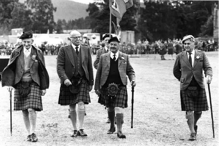 In the arena at the Aboyne Games (left to right): Chairman Alistair J. Lilburn, of Coul; Lord Lieutenant of Aberdeenshire, Maitland Mackie; Games Chieftain the Marquess of Huntly, with his Standard Bearer, and vice-chairman William Colclough. 1979