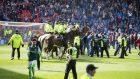 Mounted officers restored order following the pitch invasion at the end of the Scottish Cup final in May
