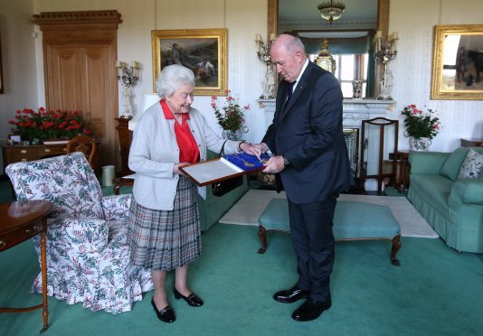 Queen Elizabeth II in the Balmoral tartan