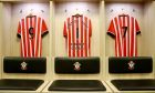 Premier Punt shirts hang in St Mary's dressing room