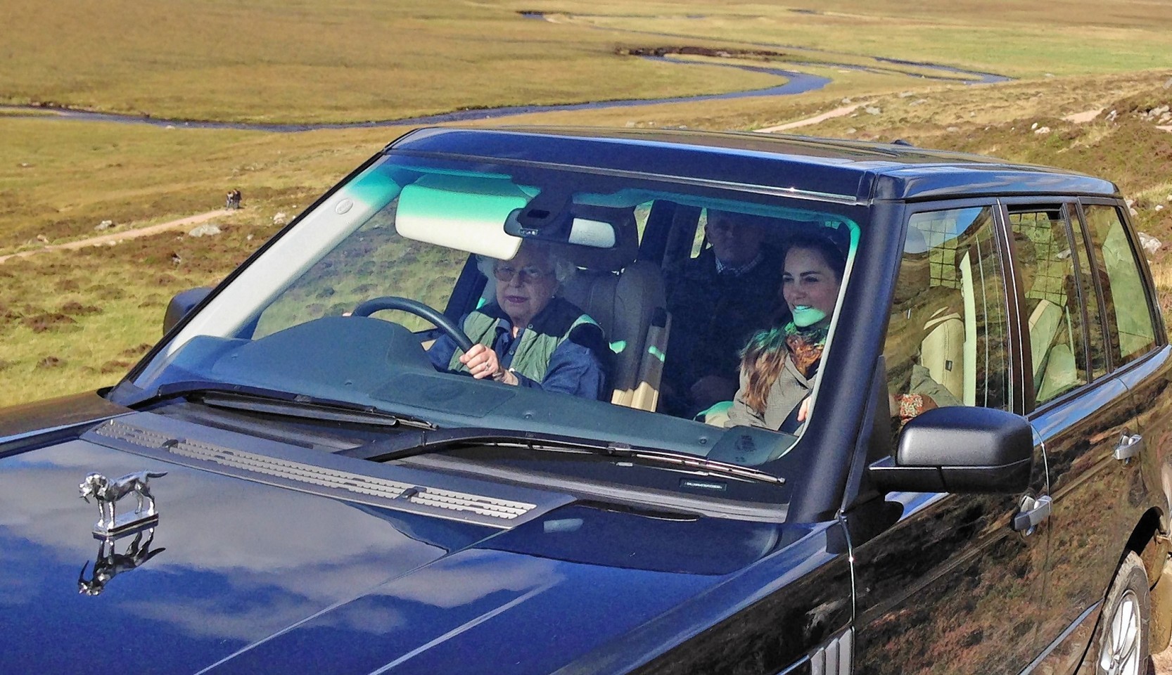 The Queen driving Kate(The Duchess of Cambridge) near Loch Muick on the Balmoral Estate.