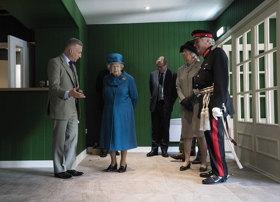 The Queen at Prince Charles's under-construction Highgrove outlet