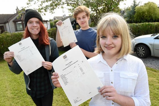 Flossie, Harry and (right) Felix Roberts from Insch who all did well in their Nat 5's with straight A's from Flossie and Felix and three A's and two B's from Harry.