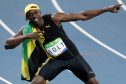 Unstoppable: Usain Bolt claimed his third gold in the 100m.