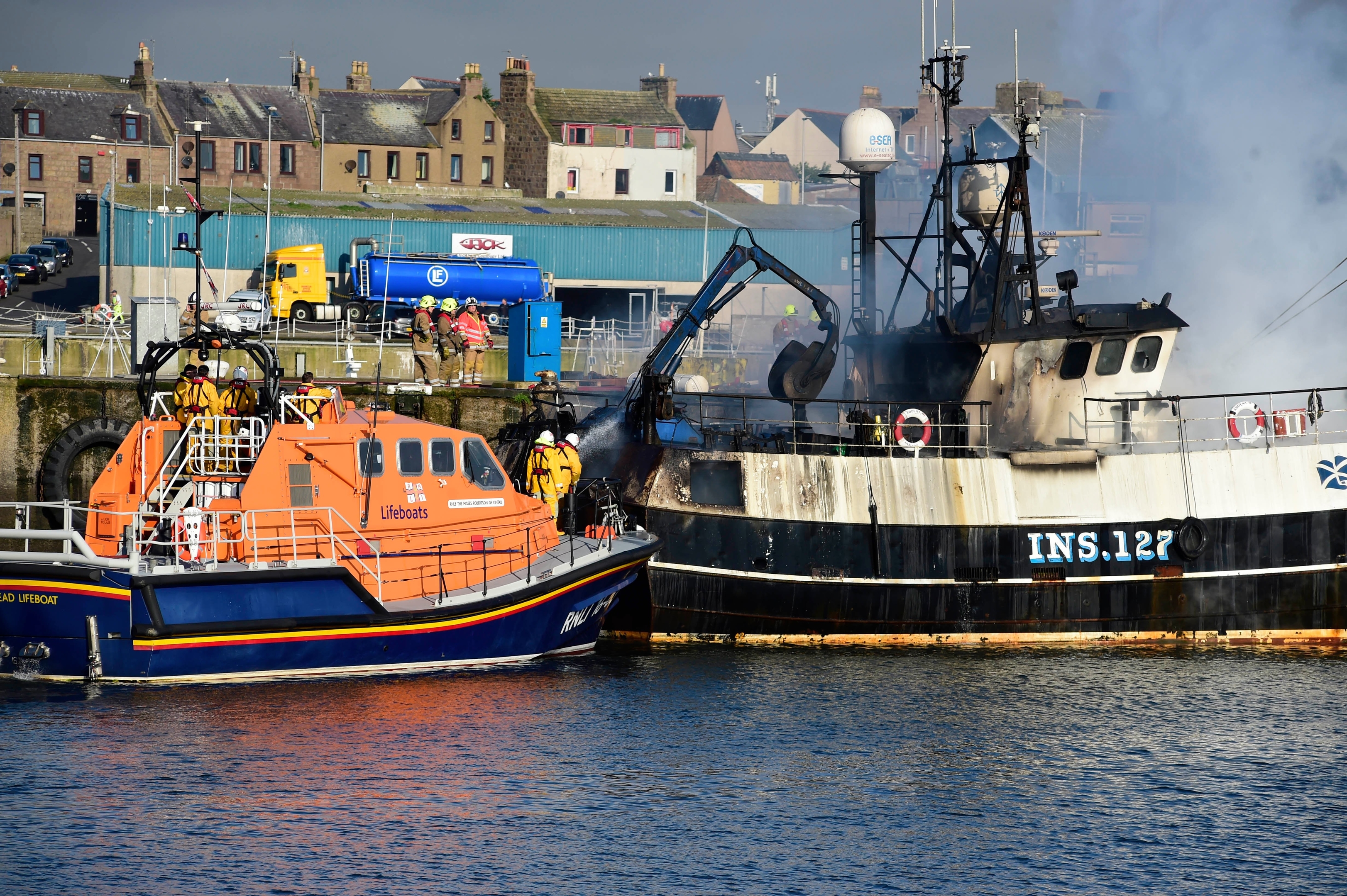 THE BOAT ON FIRE IN PETERHEAD HARBOUR