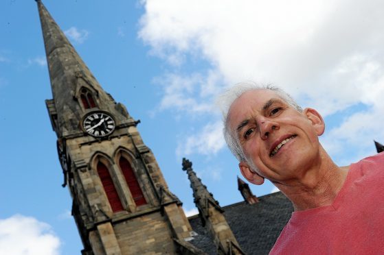 Ali MacDonald has attempted to repair one of the tower clocks in Elgin