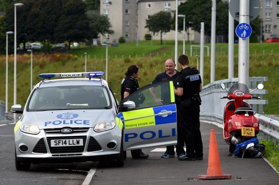 Police at the scene of the crash on the third Don crossing.