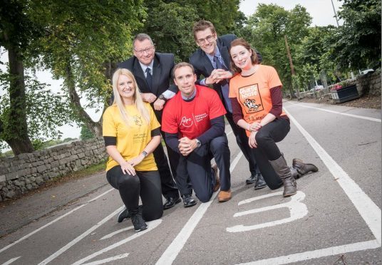 (L-R) Donald Shaw, Peter Best, Dandara’s sales manager, Claire Bush the ARCHIE Foundation, Russell Anderson, Dr Sorcha Hume from Charlie House